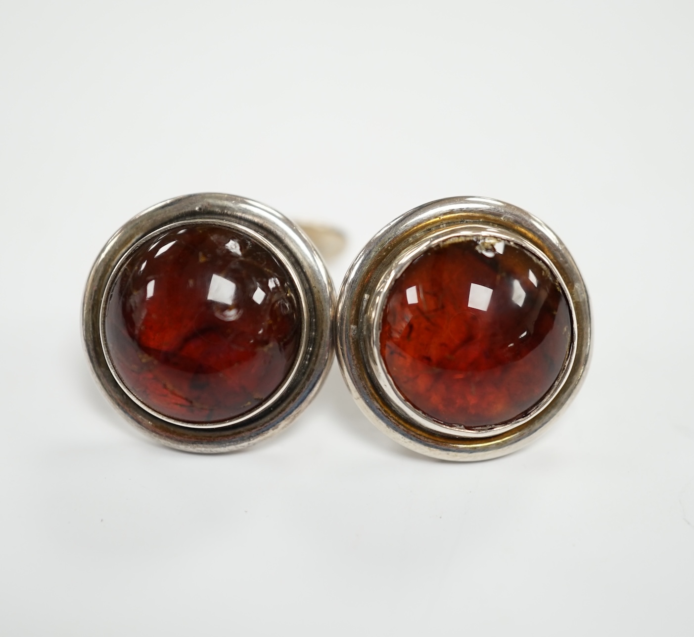 A pair of mid 20th century Danish sterling and cabochon amber set cufflinks, by Carl Ove Frydensberg, diameter 20mm.